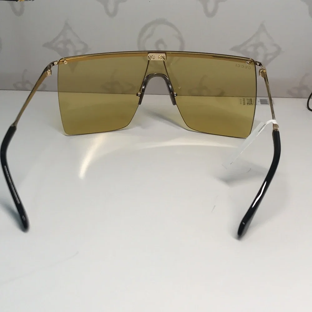 New Authentic GG1096S 003 Sunglasses by Gucci™ Shield, Material: Metal, Rimless.